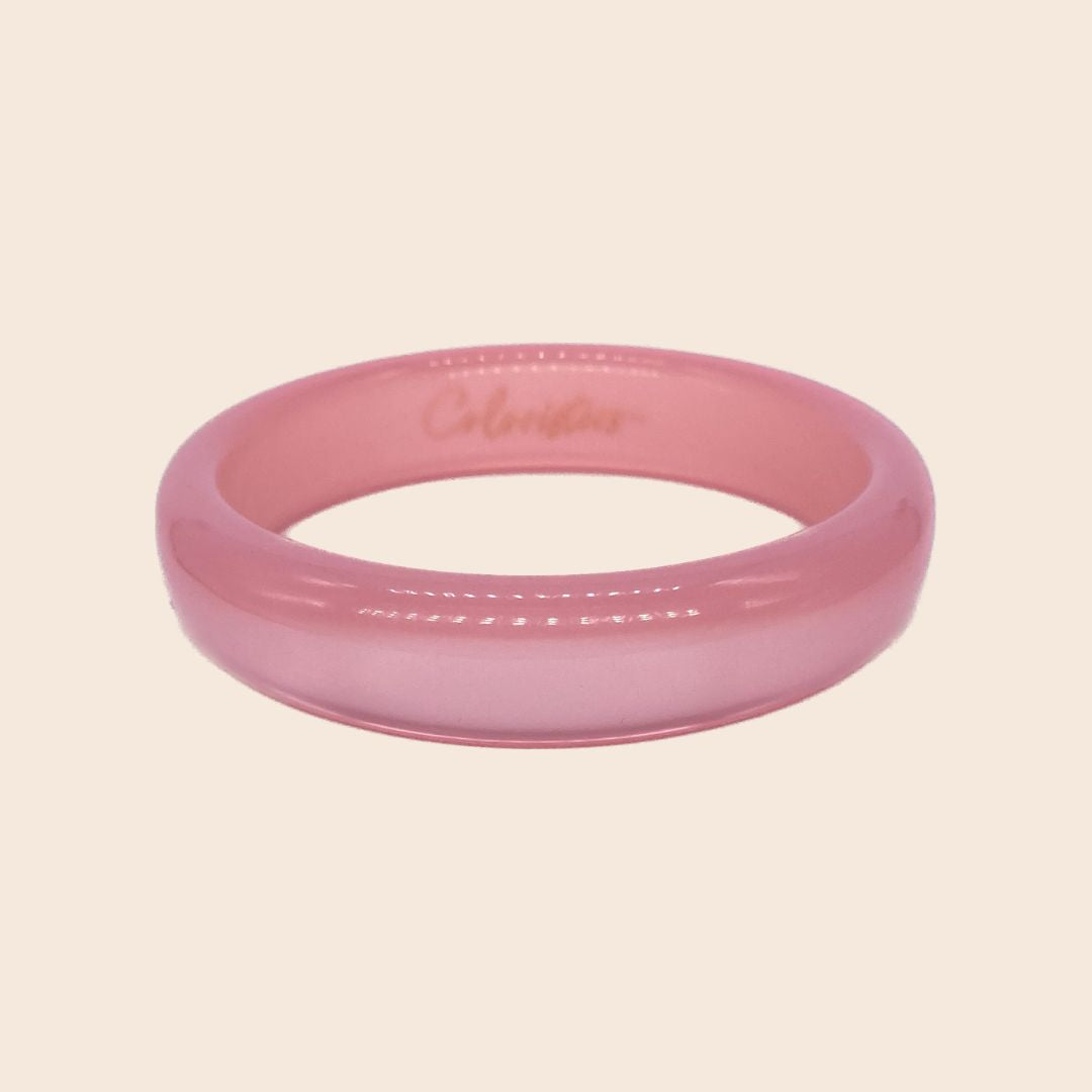 Glänzender Coloristers Armreifen in Rosa. Shiny Coloristers Bangle in Rosa.