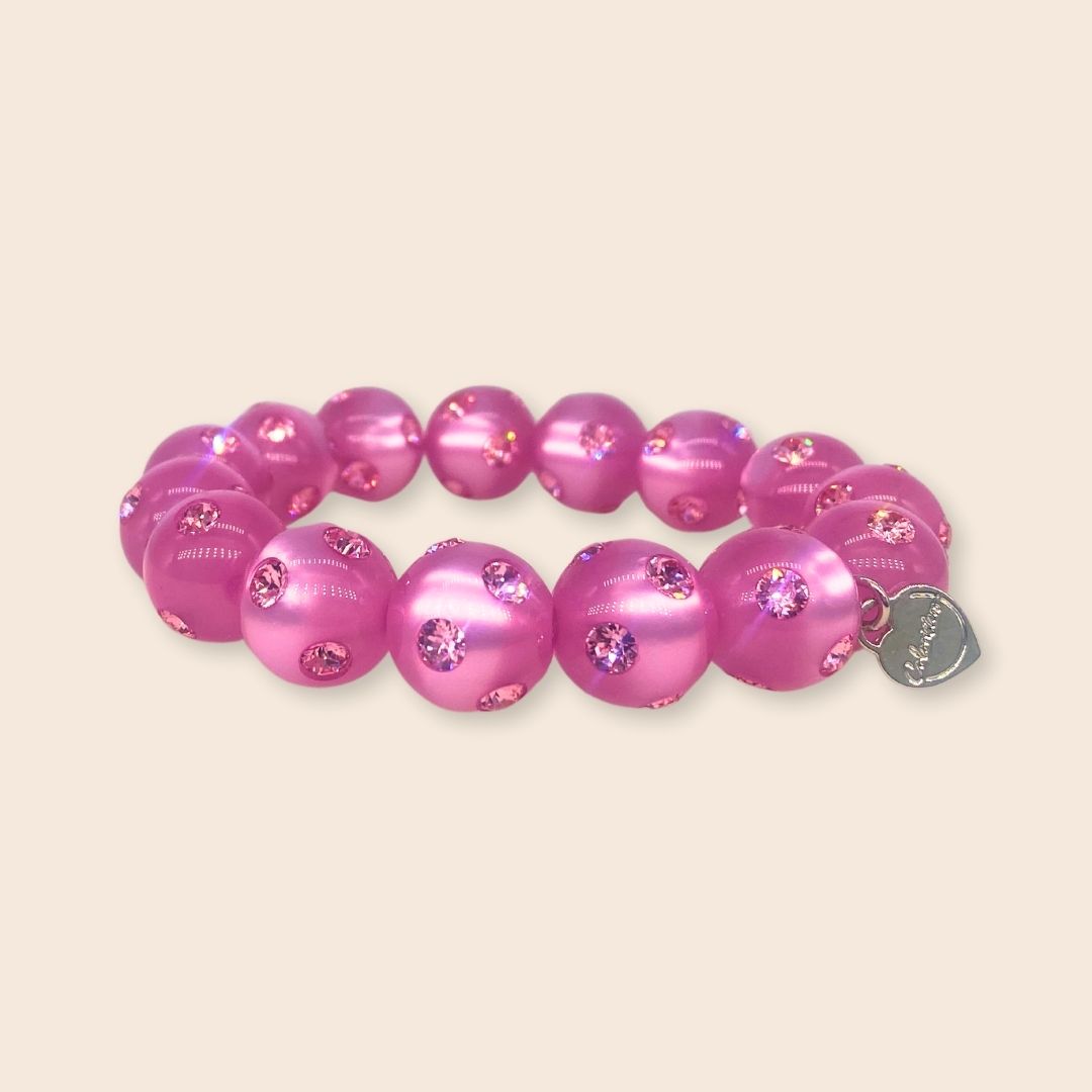 Coloristers Perlenarmband mit Kristallen in pink. Coloristers Pearl bracelet with crystals in pink.