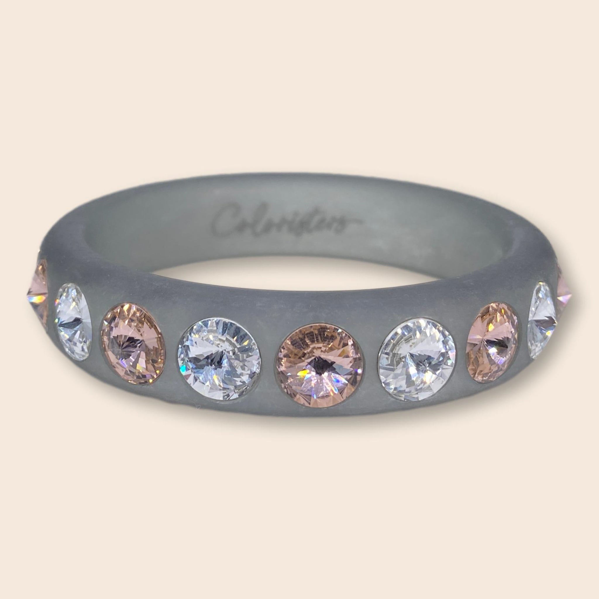 Grauer Coloristers Armreifen Sassari mit pinken Kristallen. Grey Coloristers Bangle Sassari with pink crystals.